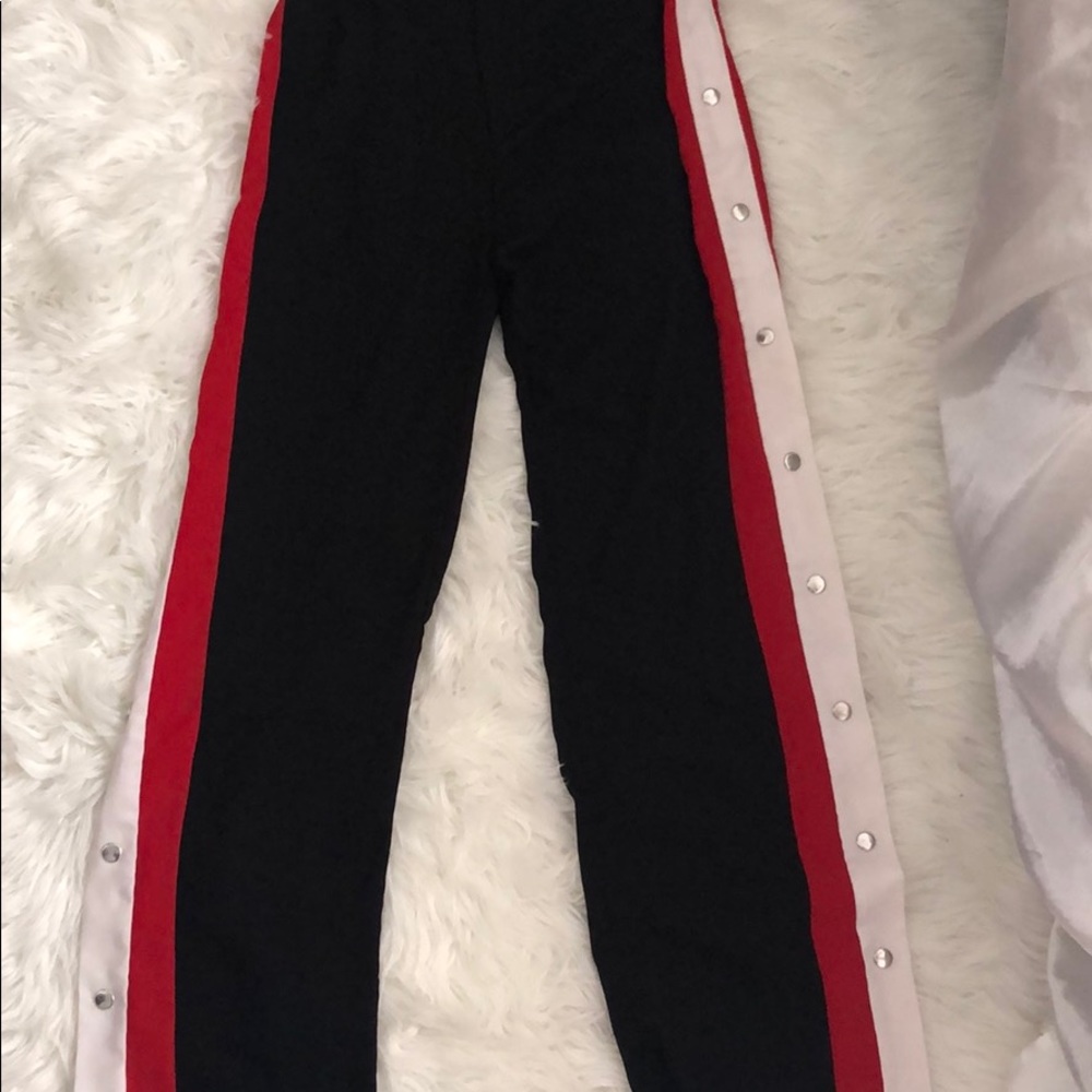 Black red and white button up pants